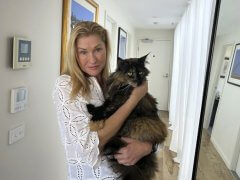 Margo Neas holds her cat Mittens