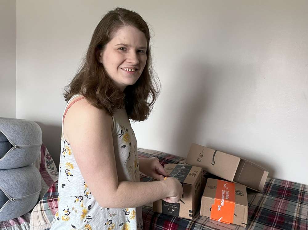 opening boxes of cat collar cameras