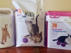 three packages of up & up cat litter